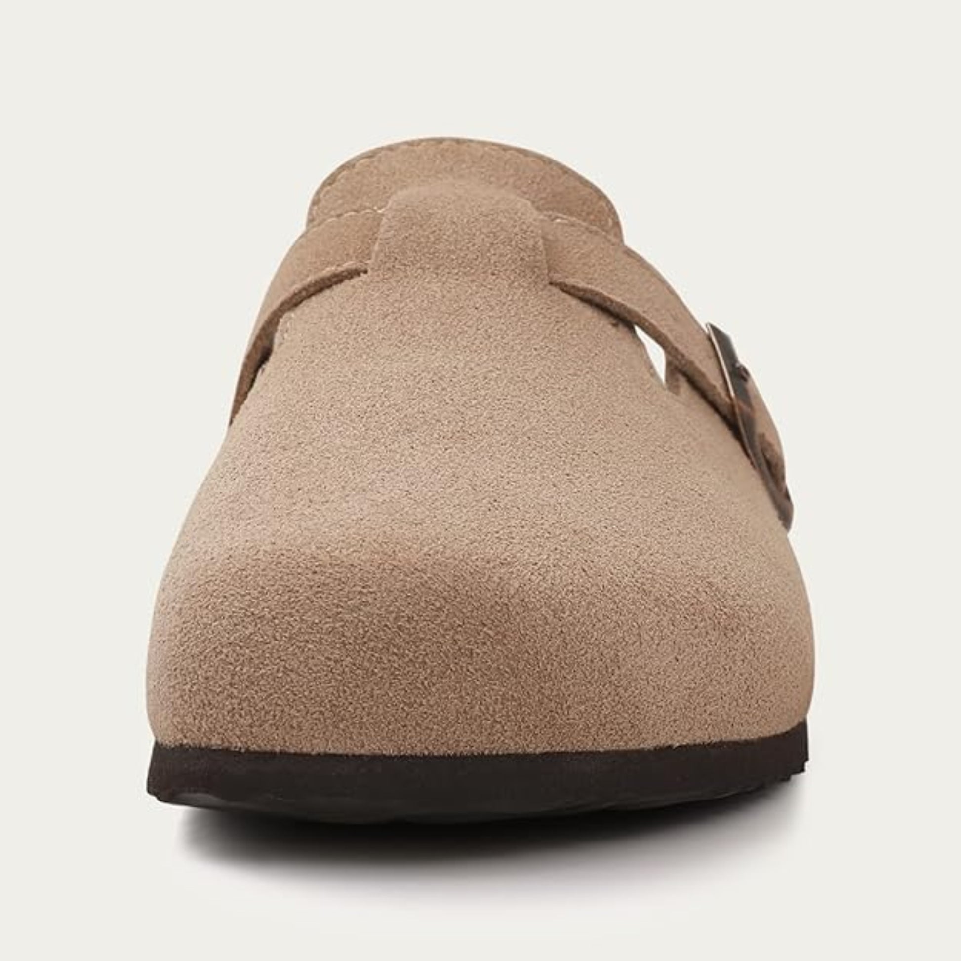 Brown suede clog shoe on a white background