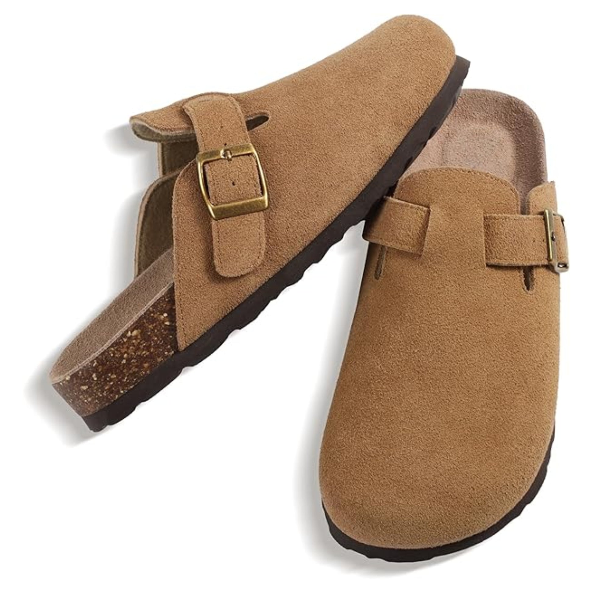Pair of brown suede clogs with buckles on a white background