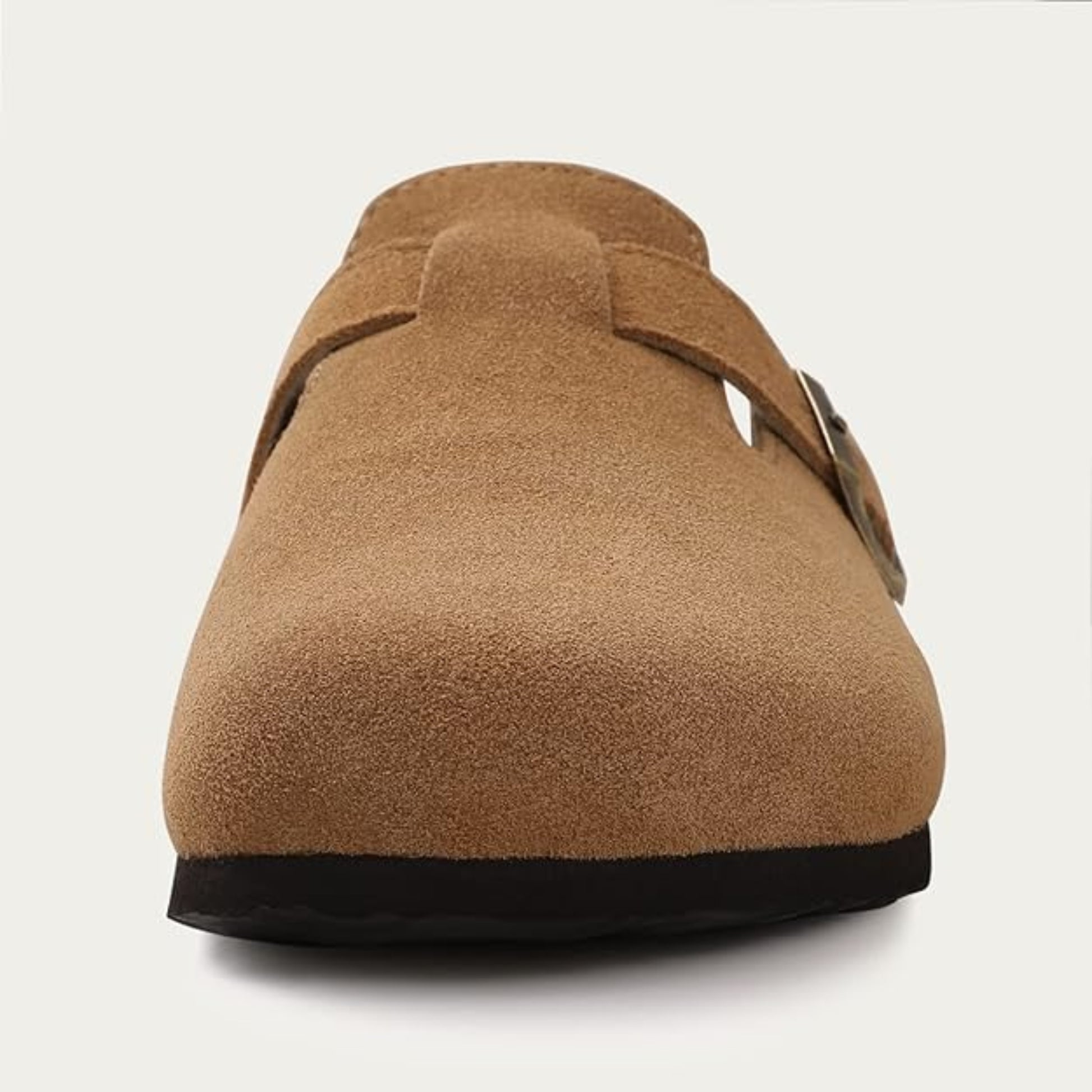 Brown suede clog shoe on a white background