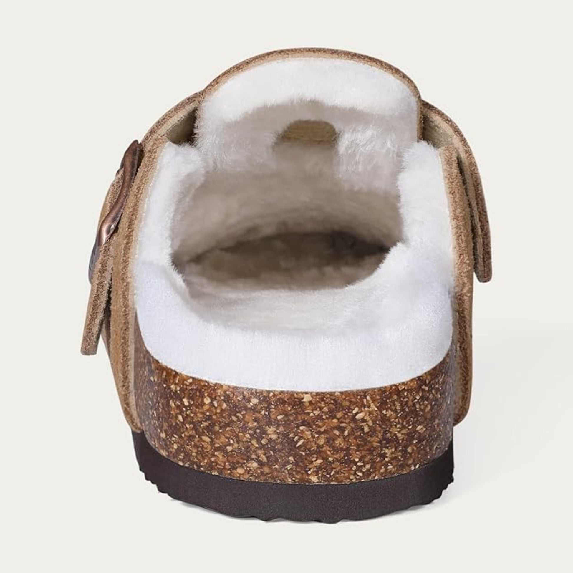 Brown slipper with white fur lining on a light gray background
