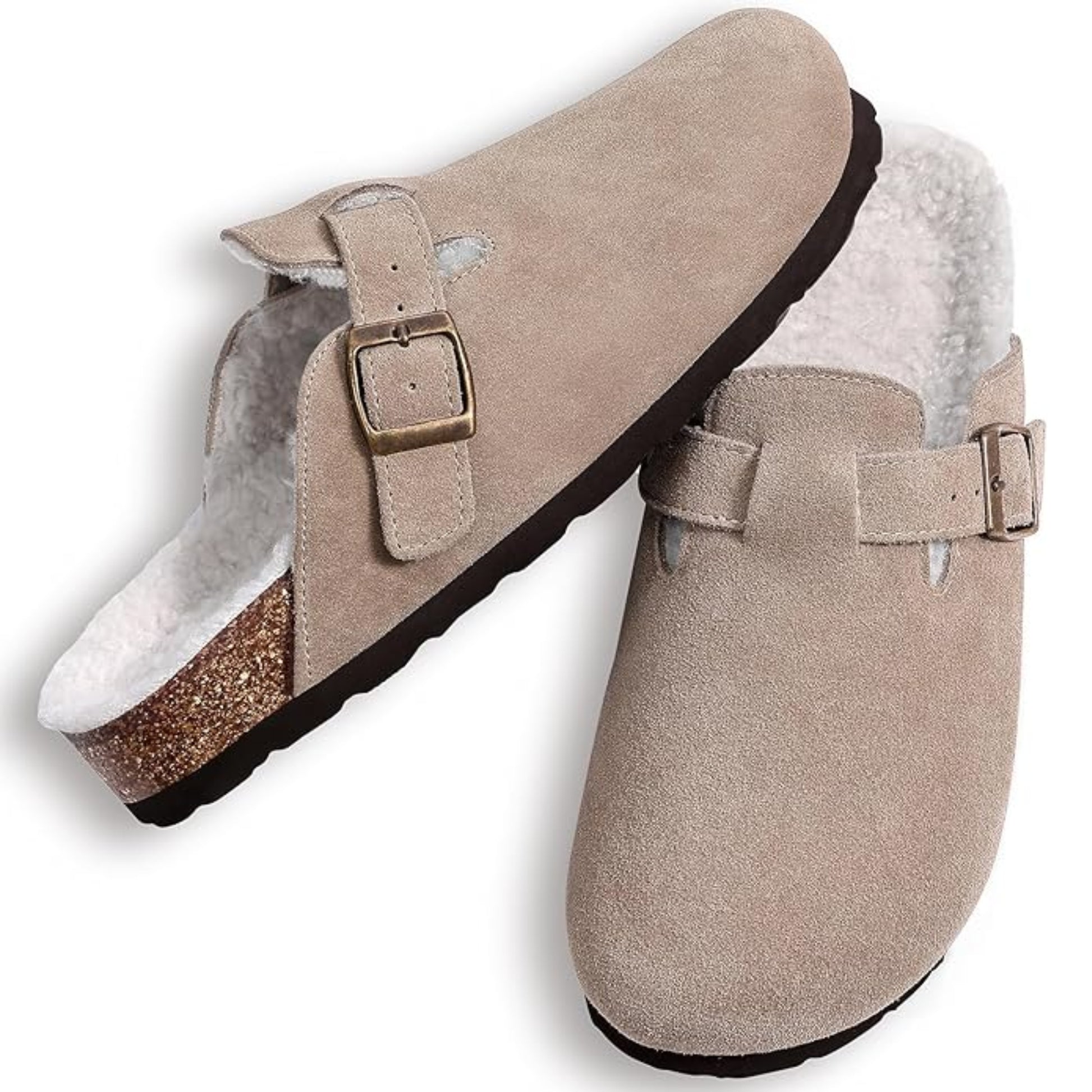 Pair of beige suede clogs with white fur lining on a light gray background
