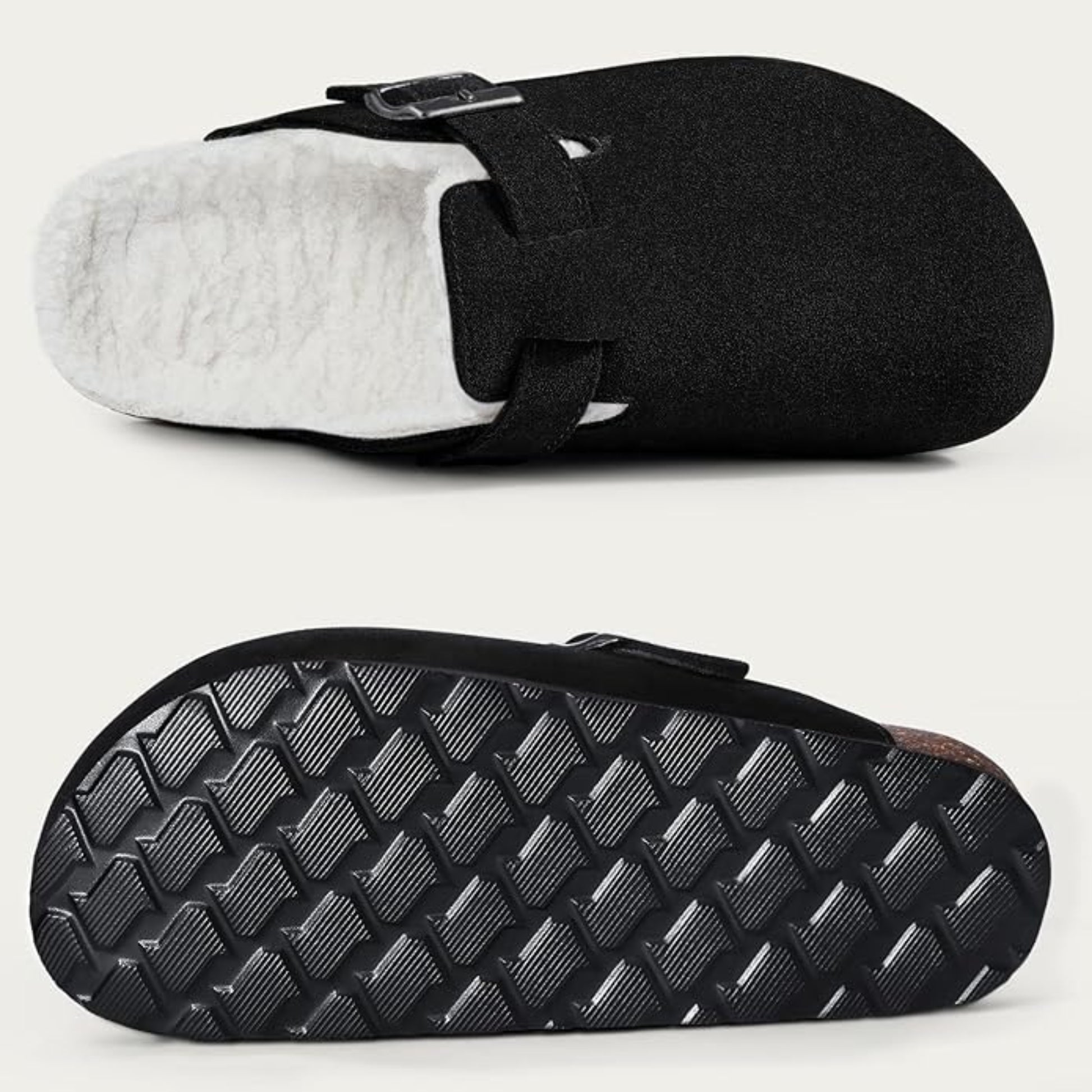 Black and white slipper with textured sole on a light gray background